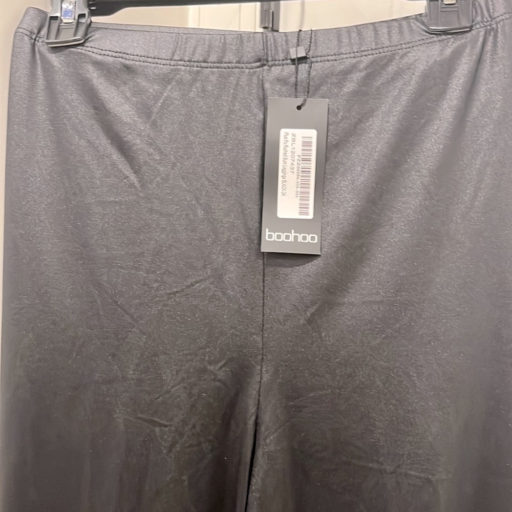 Brand new with tags. Boo-boo black leggings with sheen.